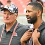 Cleveland Browns co-owner Jimmy Haslam talks with General Manager Andrew Berry during the fourth quarter of a preseason game against the Philadelphia Eagles at FirstEnergy Stadium on August 21, 2022 in Cleveland, Ohio. The Eagles defeated the Browns 21-20.