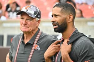 Cleveland Browns co-owner Jimmy Haslam talks with General Manager Andrew Berry during the fourth quarter of a preseason game against the Philadelphia Eagles at FirstEnergy Stadium on August 21, 2022 in Cleveland, Ohio. The Eagles defeated the Browns 21-20.