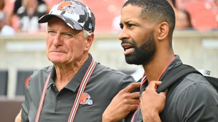 Cleveland Browns co-owner Jimmy Haslam talks with General Manager Andrew Berry during the fourth quarter of a preseason game against the Philadelphia Eagles at FirstEnergy Stadium on August 21, 2022 in Cleveland, Ohio. The Eagles defeated the Browns 21-20.