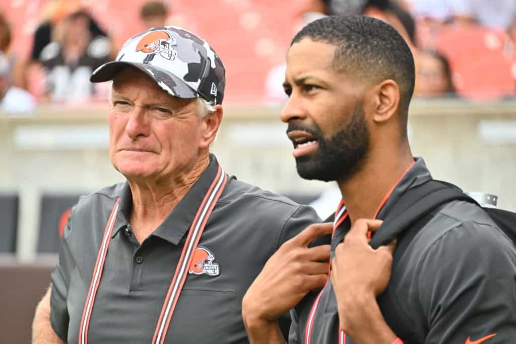 Cleveland Browns co-owner Jimmy Haslam talks with General Manager Andrew Berry during the fourth quarter of a preseason game against the Philadelphia Eagles at FirstEnergy Stadium on August 21, 2022 in Cleveland, Ohio. The Eagles defeated the Browns 21-20. 