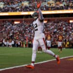 Michael Woods II #12 of the Cleveland Browns reacts after the Cleveland Browns scored a touchdown during the fourth quarter against the Washington Commanders at FedExField on January 01, 2023 in Landover, Maryland.