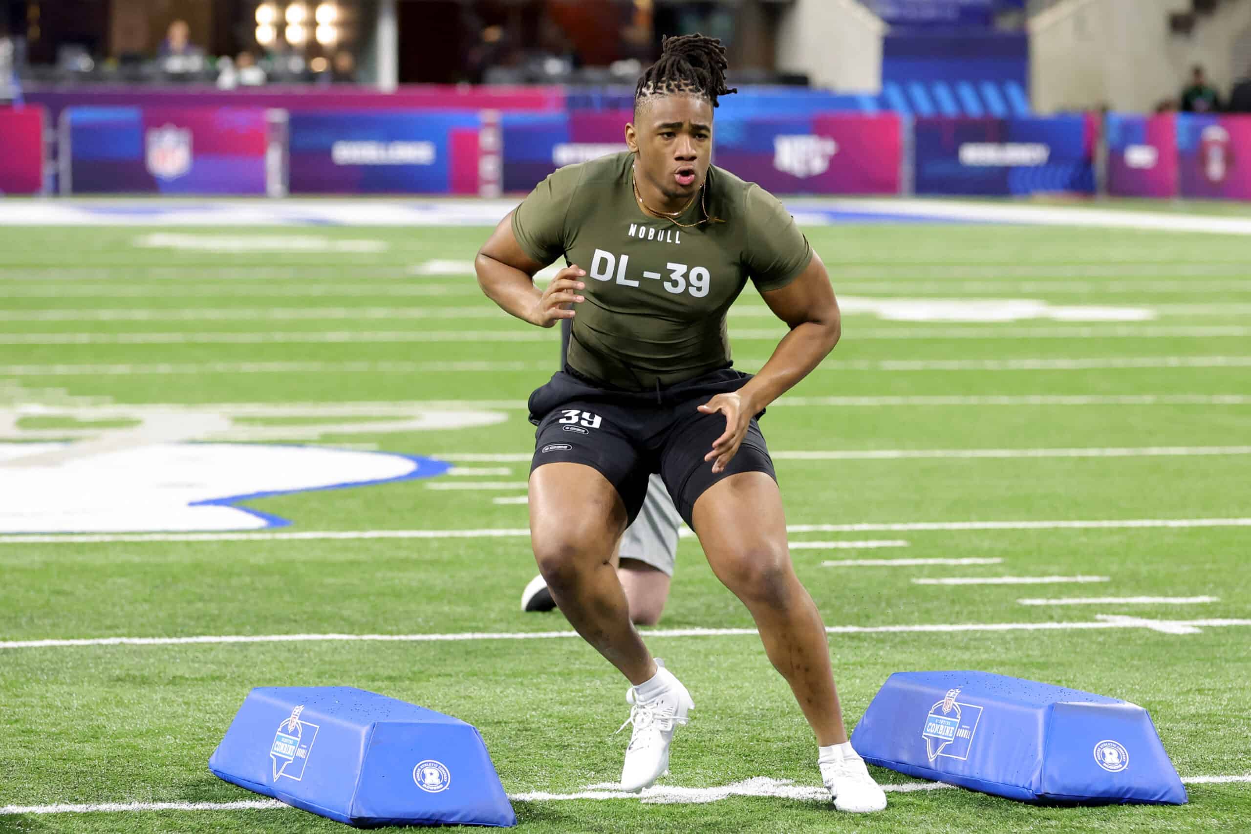 Defensive lineman Isaiah Mcguire of Missouri participates in a drill during the NFL Combine at Lucas Oil Stadium on March 02, 2023 in Indianapolis, Indiana.