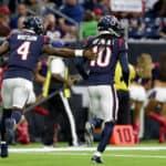 Deshaun Watson #4 of the Houston Texans congratulates DeAndre Hopkins #10 after a touchdown in the first quarter against the Detroit Lions during the preseason game at NRG Stadium on August 17, 2019 in Houston, Texas.