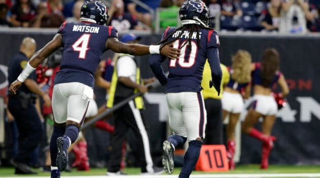 Deshaun Watson #4 of the Houston Texans congratulates DeAndre Hopkins #10 after a touchdown in the first quarter against the Detroit Lions during the preseason game at NRG Stadium on August 17, 2019 in Houston, Texas.