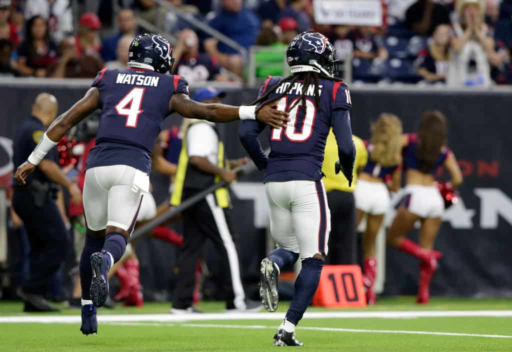 Deshaun Watson #4 of the Houston Texans congratulates DeAndre Hopkins #10 after a touchdown in the first quarter against the Detroit Lions during the preseason game at NRG Stadium on August 17, 2019 in Houston, Texas. 