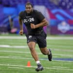 Dawand Jones of Ohio State participates in a drill during the NFL Combine at Lucas Oil Stadium on March 05, 2023 in Indianapolis, Indiana.