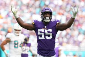 Za'Darius Smith #55 of the Minnesota Vikings celebrates a sack against Teddy Bridgewater #5 of the Miami Dolphins during the third quarter at Hard Rock Stadium on October 16, 2022 in Miami Gardens, Florida.