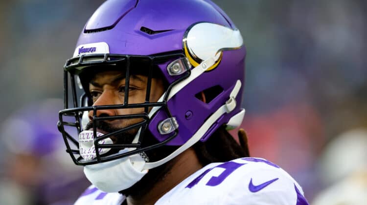 Za'Darius Smith #55 of the Minnesota Vikings warms up prior to a game against the Green Bay Packers at Lambeau Field on January 01, 2023 in Green Bay, Wisconsin.