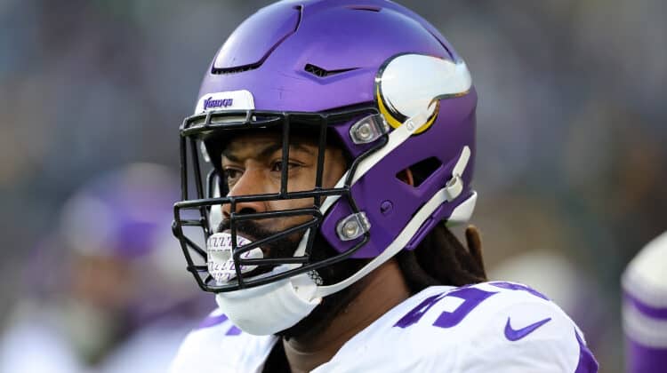Za'Darius Smith #55 of the Minnesota Vikings participates in warmups prior to a game against the Green Bay Packers at Lambeau Field on January 01, 2023 in Green Bay, Wisconsin.