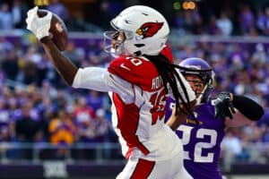 DeAndre Hopkins #10 of the Arizona Cardinals catches the ball for a touchdown as Harrison Smith #22 of the Minnesota Vikings defends during the second quarter at U.S. Bank Stadium on October 30, 2022 in Minneapolis, Minnesota.