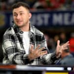 Football Quarterback Johnny Manziel talks onset prior to the SEC Championship game between the LSU Tigers and the Georgia Bulldogs at Mercedes-Benz Stadium on December 03, 2022 in Atlanta, Georgia.
