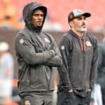 Deshaun Watson #4 stands on the field with head coach Kevin Stefanski of the Cleveland Browns prior to the start of a preseason game against the Philadelphia Eagles at FirstEnergy Stadium on August 21, 2022 in Cleveland, Ohio.