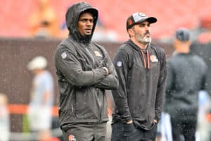 Deshaun Watson #4 stands on the field with head coach Kevin Stefanski of the Cleveland Browns prior to the start of a preseason game against the Philadelphia Eagles at FirstEnergy Stadium on August 21, 2022 in Cleveland, Ohio.