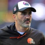 Head coach Kevin Stefanski of the Cleveland Browns looks on during pregame warmups before the game against the Atlanta Falcons at Mercedes-Benz Stadium on October 02, 2022 in Atlanta, Georgia