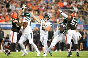 Zach Wilson #2 of the New York Jets throws a pass during the first half of the 2023 Pro Hall of Fame Game against the Cleveland Browns at Tom Benson Hall Of Fame Stadium on August 3, 2023 in Canton, Ohio.