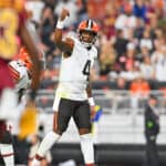 Deshaun Watson #4 of the Cleveland Browns signals to his teammates during the first half of a preseason game against the Washington Commanders at Cleveland Browns Stadium on August 11, 2023 in Cleveland, Ohio.