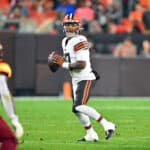 Quarterback Dorian Thompson-Robinson #17 of the Cleveland Browns looks for a pass during the second half of a preseason game against the Washington Commanders at Cleveland Browns Stadium on August 11, 2023 in Cleveland, Ohio. The Commanders defeated the Browns.
