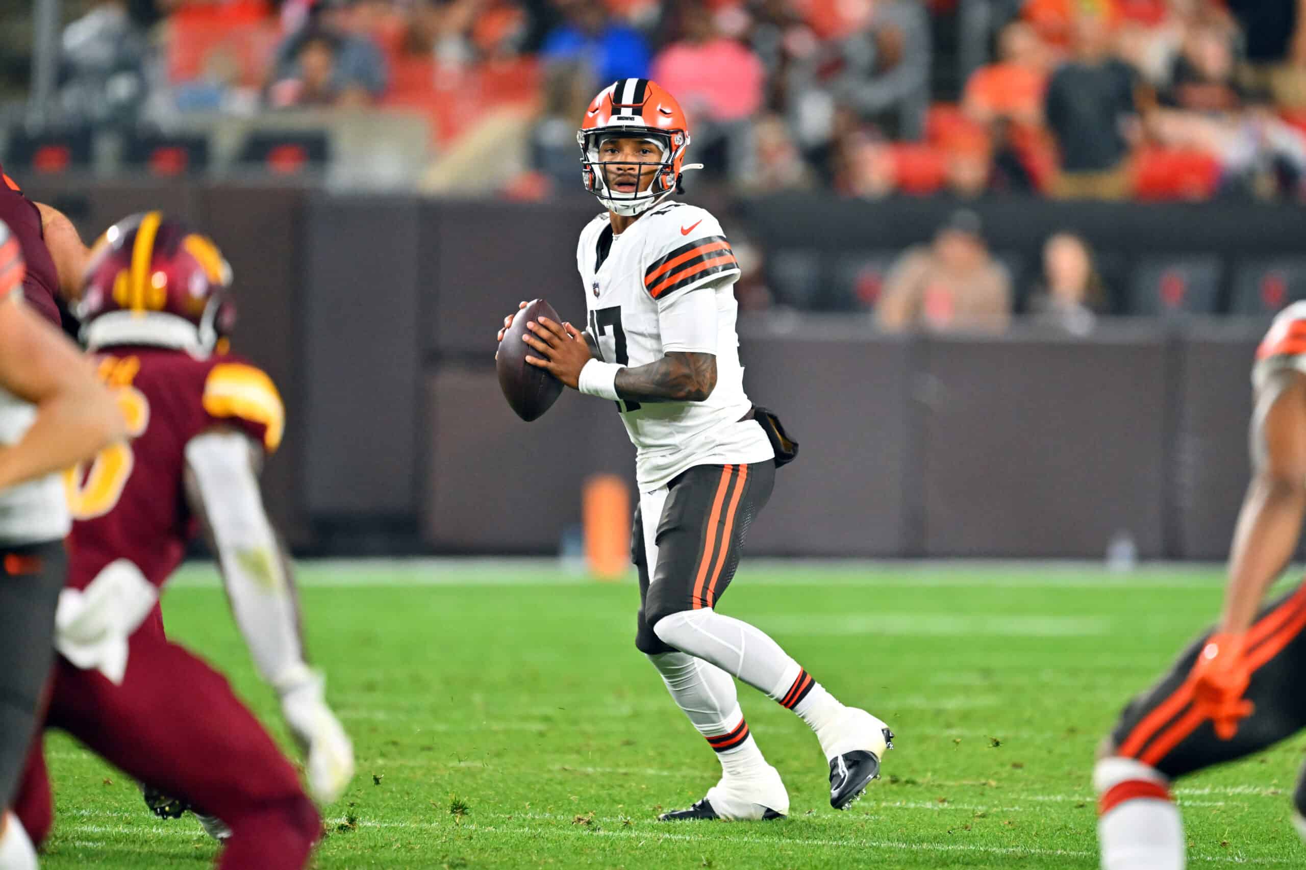 Quarterback Dorian Thompson-Robinson #17 of the Cleveland Browns looks for a pass during the second half of a preseason game against the Washington Commanders at Cleveland Browns Stadium on August 11, 2023 in Cleveland, Ohio. The Commanders defeated the Browns.