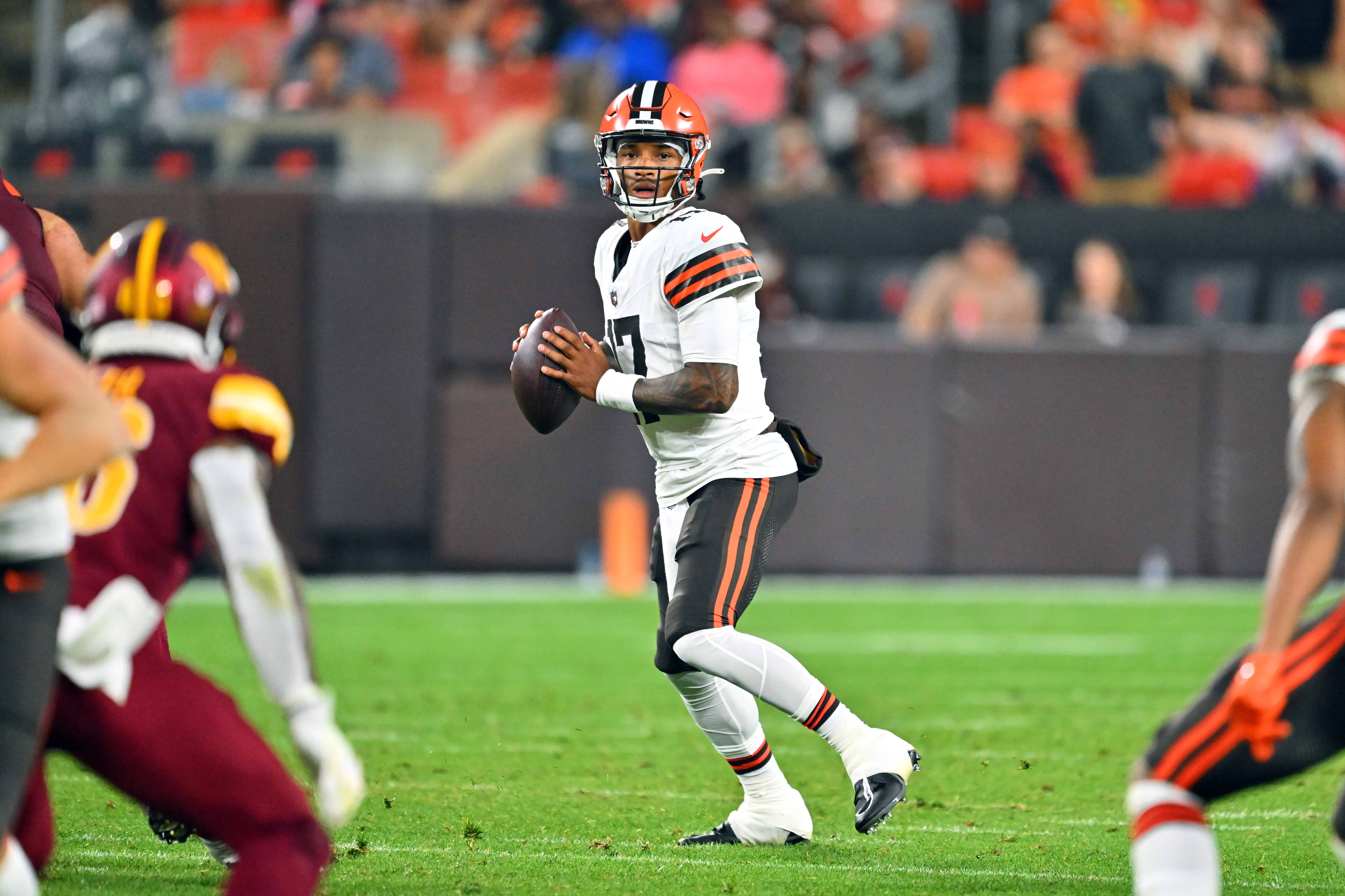 Quarterback Dorian Thompson-Robinson #17 of the Cleveland Browns looks for a pass during the second half of a preseason game against the Washington Commanders at Cleveland Browns Stadium on August 11, 2023 in Cleveland, Ohio. The Commanders defeated the Browns.  