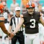 Cade York #3 of the Cleveland Browns celebrates with Corey Bojorquez #13 of the Cleveland Browns after a successful field goal in the third quarter of the game against the Miami Dolphins at Hard Rock Stadium on November 13, 2022 in Miami Gardens, Florida.