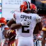 Donovan Peoples-Jones #11 of the Cleveland Browns celebrates with teammate Amari Cooper #2 after scoring a touchdown against the Washington Commanders during the third quarter of the game at FedExField on January 01, 2023 in Landover, Maryland.