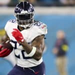 Derrick Henry #22 of the Tennessee Titans runs the ball during the first quarter against the Jacksonville Jaguars at TIAA Bank Field on January 07, 2023 in Jacksonville, Florida.