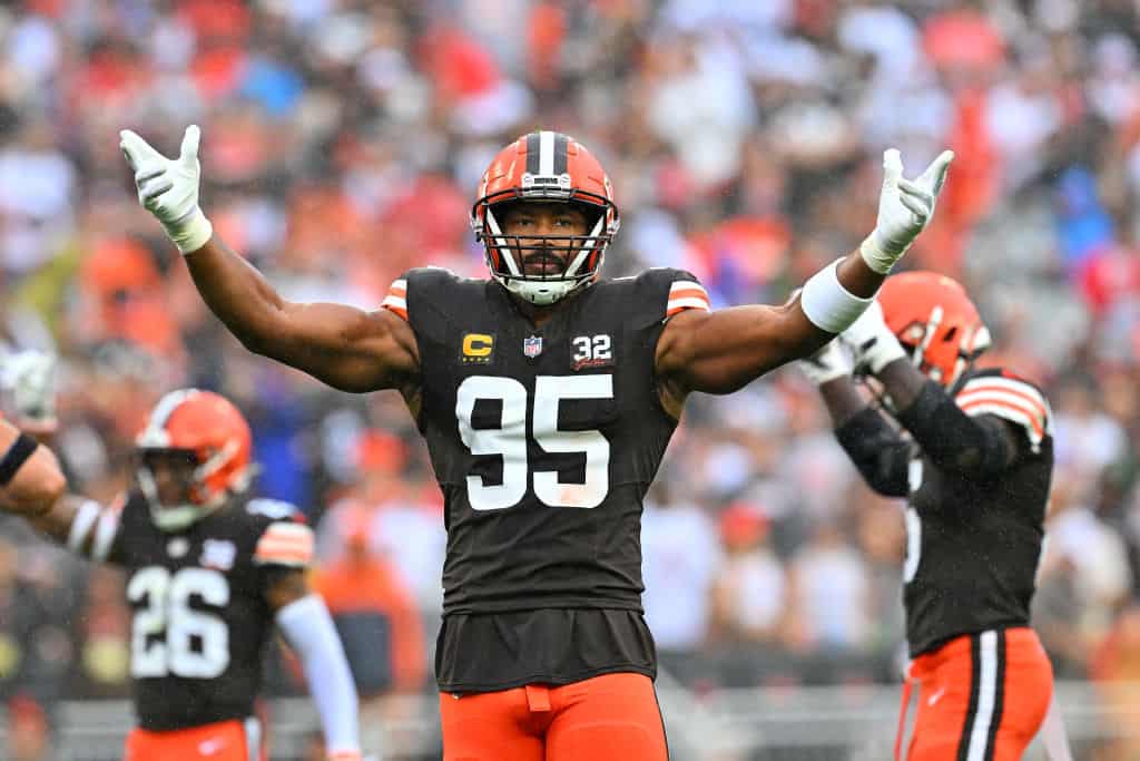 Myles Garrett #95 of the Cleveland Browns gestures to the fans during the first half against the Cincinnati Bengals at Cleveland Browns Stadium on September 10, 2023 in Cleveland, Ohio.