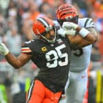 Myles Garrett #95 of the Cleveland Browns battles with Orlando Brown Jr. #75 of the Cincinnati Bengals during the first half at Cleveland Browns Stadium on September 10, 2023 in Cleveland, Ohio.