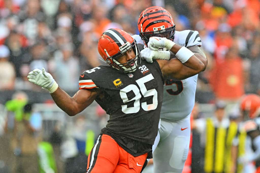 Myles Garrett #95 of the Cleveland Browns battles with Orlando Brown Jr. #75 of the Cincinnati Bengals during the first half at Cleveland Browns Stadium on September 10, 2023 in Cleveland, Ohio.
