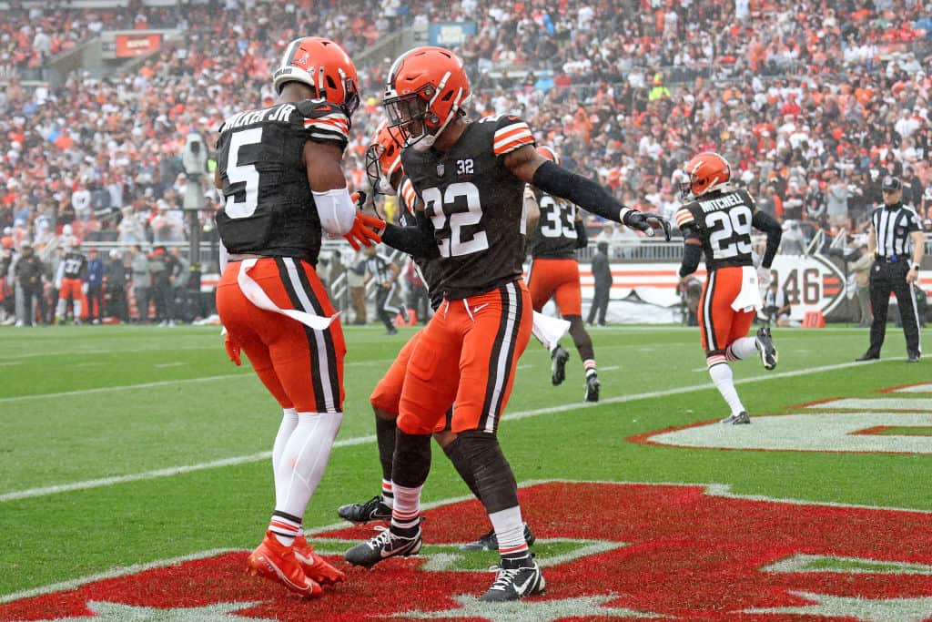 Grant Delpit #22 of the Cleveland Browns celebrates with Anthony Walker Jr. #5 after breaking up a pass against the Cincinnati Bengals during the second half at Cleveland Browns Stadium on September 10, 2023 in Cleveland, Ohio.
