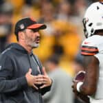 Head coach Kevin Stefanski of the Cleveland Browns speaks with Deshaun Watson #4 during warmups prior to the game against the Pittsburgh Steelers at Acrisure Stadium on September 18, 2023 in Pittsburgh, Pennsylvania.