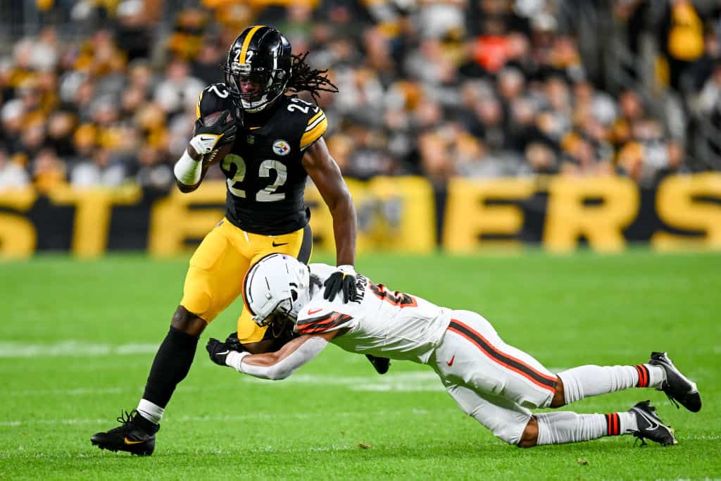 Najee Harris #22 of the Pittsburgh Steelers carries the ball against Greg Newsome II #0 of the Cleveland Browns during the second quarter at Acrisure Stadium on September 18, 2023 in Pittsburgh, Pennsylvania.