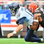 Ryan Tannehill #17 of the Tennessee Titans is sacked by Myles Garrett #95 of the Cleveland Browns during the fourth quarter at Cleveland Browns Stadium on September 24, 2023 in Cleveland, Ohio.