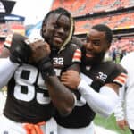 David Njoku #85 and Anthony Walker Jr. #5 of the Cleveland Browns celebrate a win over the Tennessee Titans at Cleveland Browns Stadium on September 24, 2023 in Cleveland, Ohio.