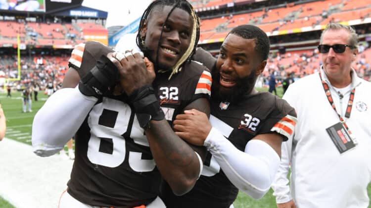 David Njoku #85 and Anthony Walker Jr. #5 of the Cleveland Browns celebrate a win over the Tennessee Titans at Cleveland Browns Stadium on September 24, 2023 in Cleveland, Ohio.