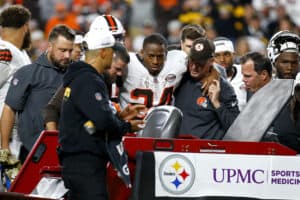 Nick Chubb #24 of the Cleveland Browns is carted off the field after sustaining a knee injury during the second quarter against the Pittsburgh Steelers at Acrisure Stadium on September 18, 2023 in Pittsburgh, Pennsylvania.