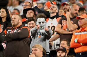 A Cleveland Browns fan dressed up for Halloween cheers during the first half of the game against the Cincinnati Bengals at FirstEnergy Stadium on October 31, 2022 in Cleveland, Ohio.
