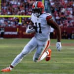 Donovan Peoples-Jones #11 of the Cleveland Browns catches a pass for a touchdown against the Washington Commanders during the third quarter of the game at FedExField on January 01, 2023 in Landover, Maryland.
