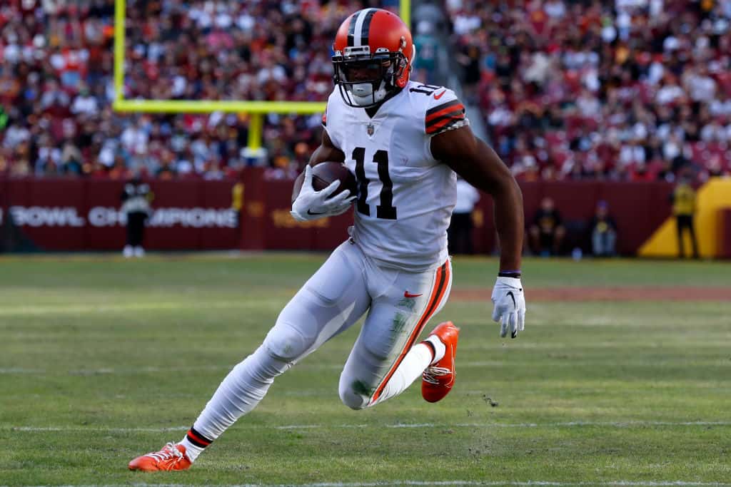 Donovan Peoples-Jones #11 of the Cleveland Browns catches a pass for a touchdown against the Washington Commanders during the third quarter of the game at FedExField on January 01, 2023 in Landover, Maryland.