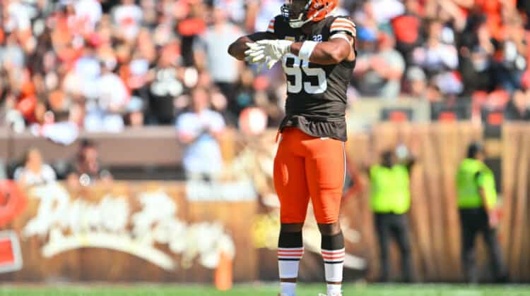 Myles Garrett #95 of the Cleveland Browns celebrates after a sack during the second quarter against the Baltimore Ravens at Cleveland Browns Stadium on October 01, 2023 in Cleveland, Ohio.