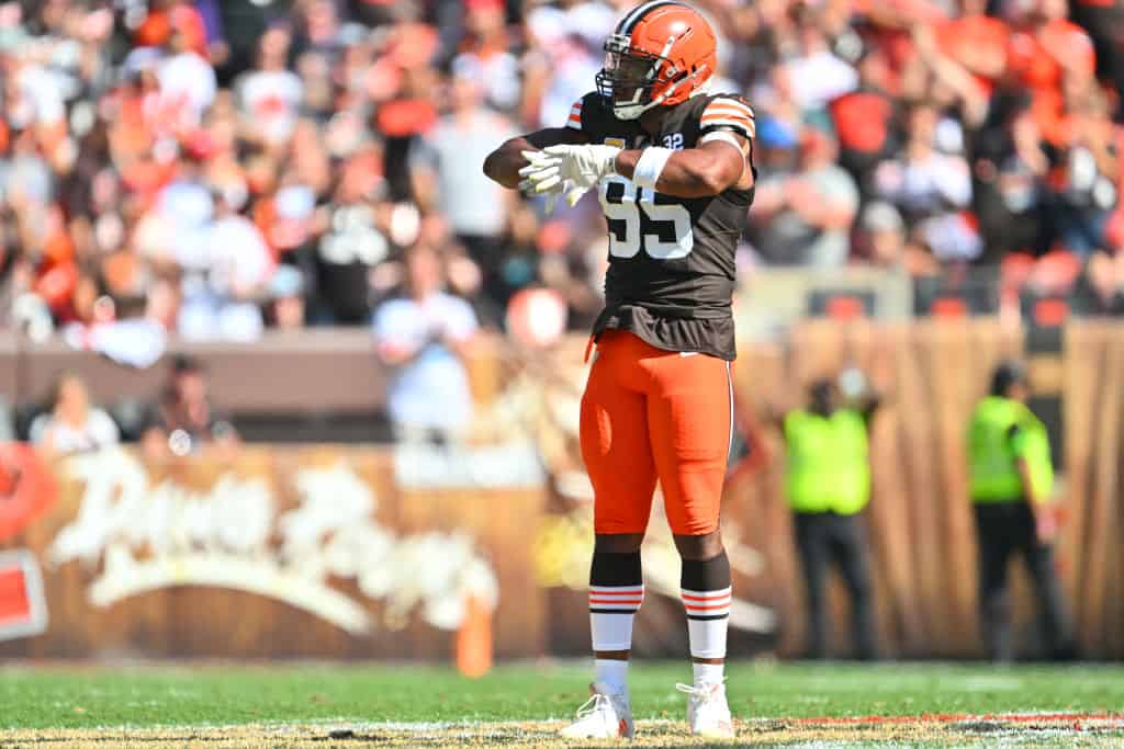 Myles Garrett #95 of the Cleveland Browns celebrates after a sack during the second quarter against the Baltimore Ravens at Cleveland Browns Stadium on October 01, 2023 in Cleveland, Ohio.