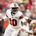 PJ Walker #10 of the Cleveland Browns attempts a pass while pressured by Clelin Ferrell #94 of the San Francisco 49ers during the fourth quarter at Cleveland Browns Stadium on October 15, 2023 in Cleveland, Ohio.
