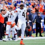 Deshaun Watson #4 of the Cleveland Browns stretches during warm ups before the game against the Indianapolis Colts at Lucas Oil Stadium on October 22, 2023 in Indianapolis, Indiana.