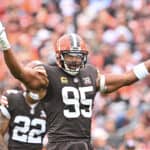 Myles Garrett #95 of the Cleveland Browns reacts after a play during the first half in the game against the Tennessee Titans at Cleveland Browns Stadium on September 24, 2023 in Cleveland, Ohio.