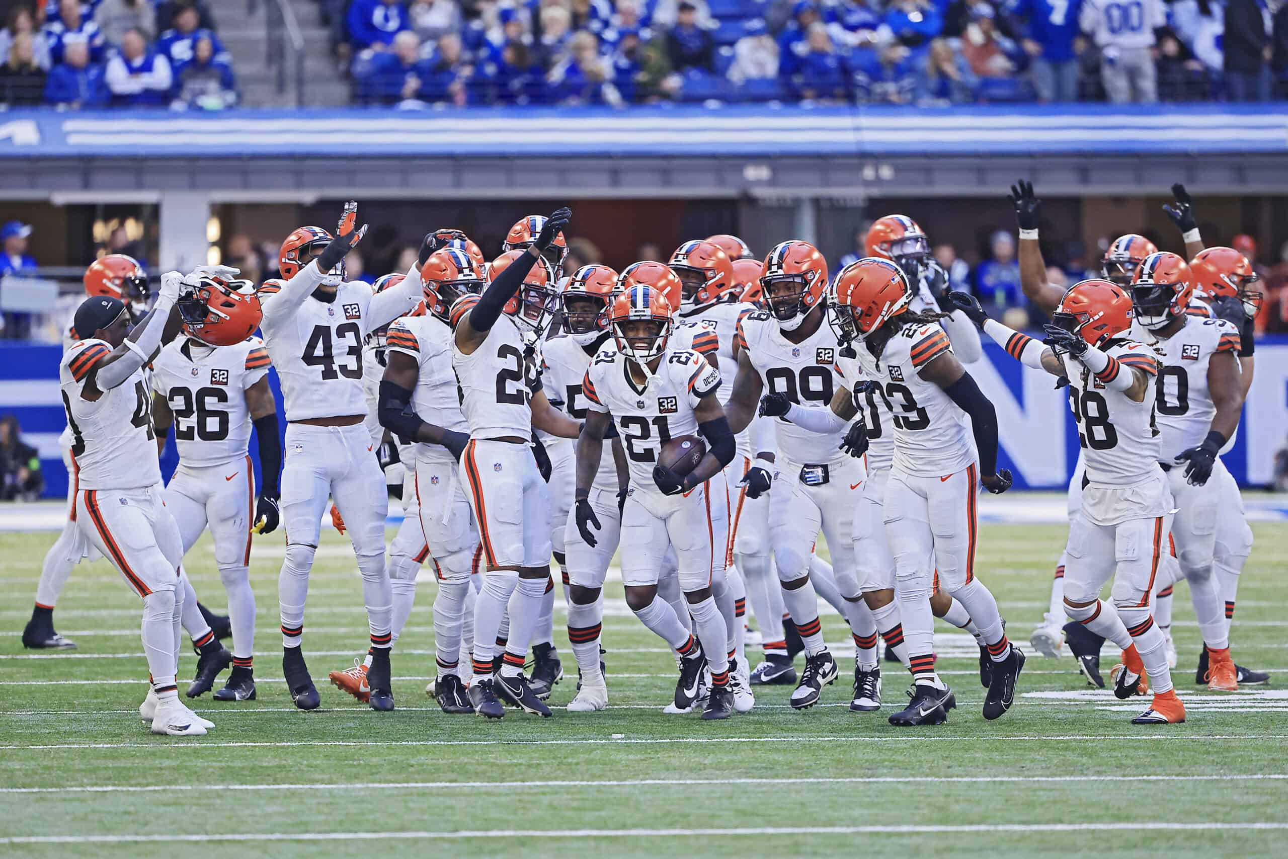 Denzel Ward #21 of the Cleveland Browns celebrates with teammates after an interception during the fourth quarter against the Indianapolis Colts at Lucas Oil Stadium on October 22, 2023 in Indianapolis, Indiana.