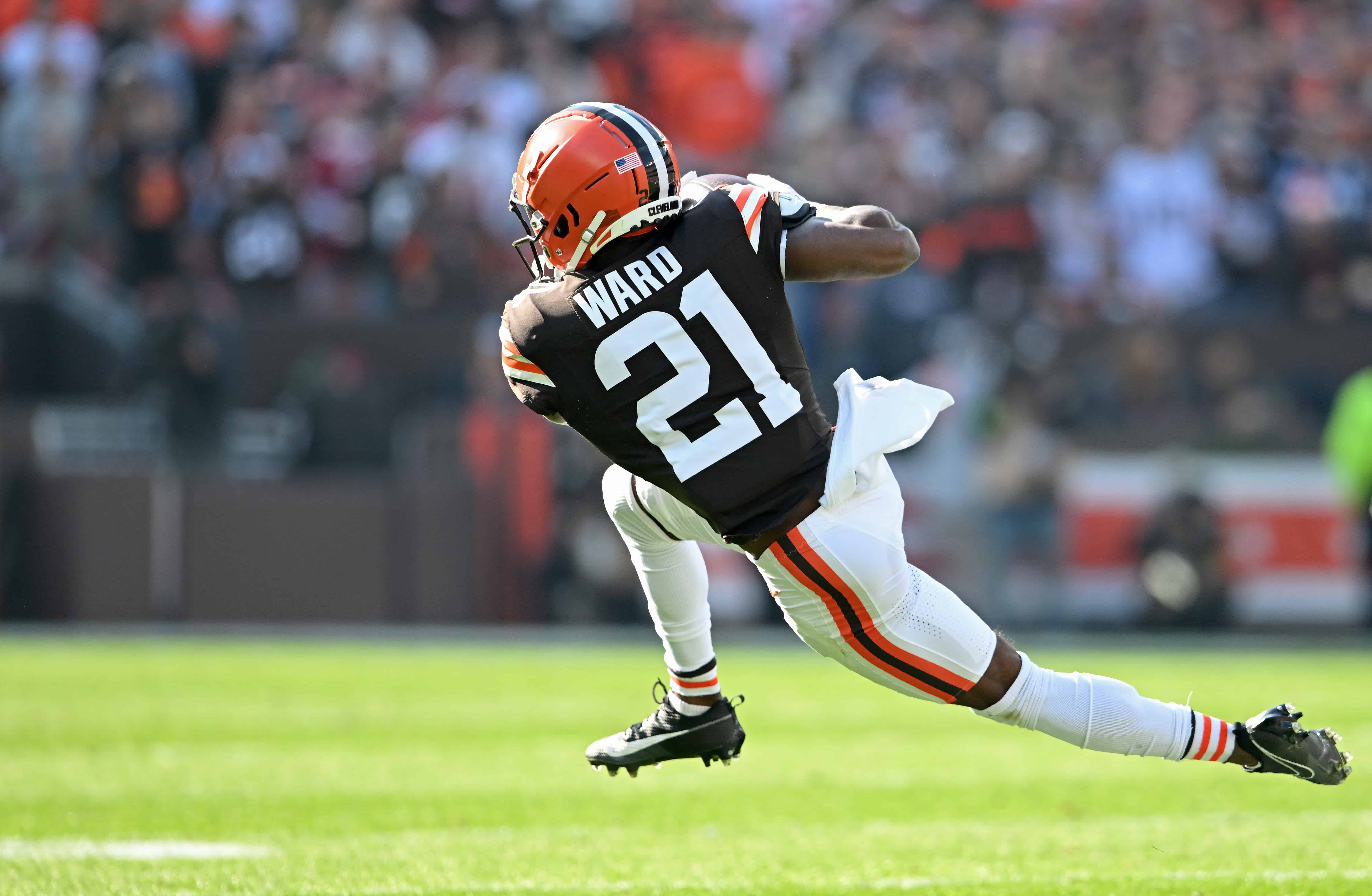 Denzel Ward #21 of the Cleveland Browns intercepts a pass against the Arizona Cardinals during the first half of the game at Cleveland Browns Stadium on November 05, 2023 in Cleveland, Ohio.