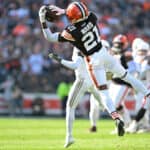 CLEVELAND, OHIO - NOVEMBER 05: Denzel Ward #21 of the Cleveland Browns intercepts a pass against the Arizona Cardinals during the first half of the game at Cleveland Browns Stadium on November 05, 2023 in Cleveland, Ohio.