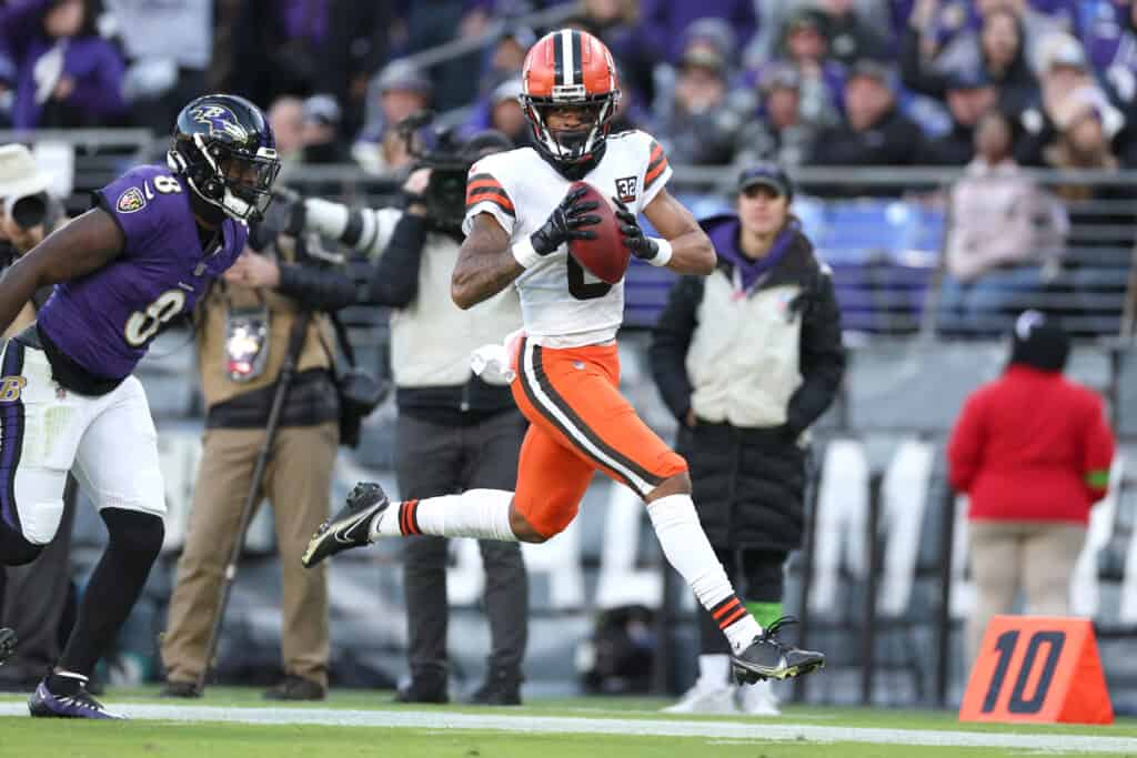 Greg Newsome II #0 of the Cleveland Browns returns an interception for a touchdown against the Baltimore Ravens during the fourth quarter at M&T Bank Stadium on November 12, 2023 in Baltimore, Maryland.