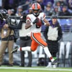 Greg Newsome II #0 of the Cleveland Browns returns an interception for a touchdown against the Baltimore Ravens during the fourth quarter at M&T Bank Stadium on November 12, 2023 in Baltimore, Maryland.