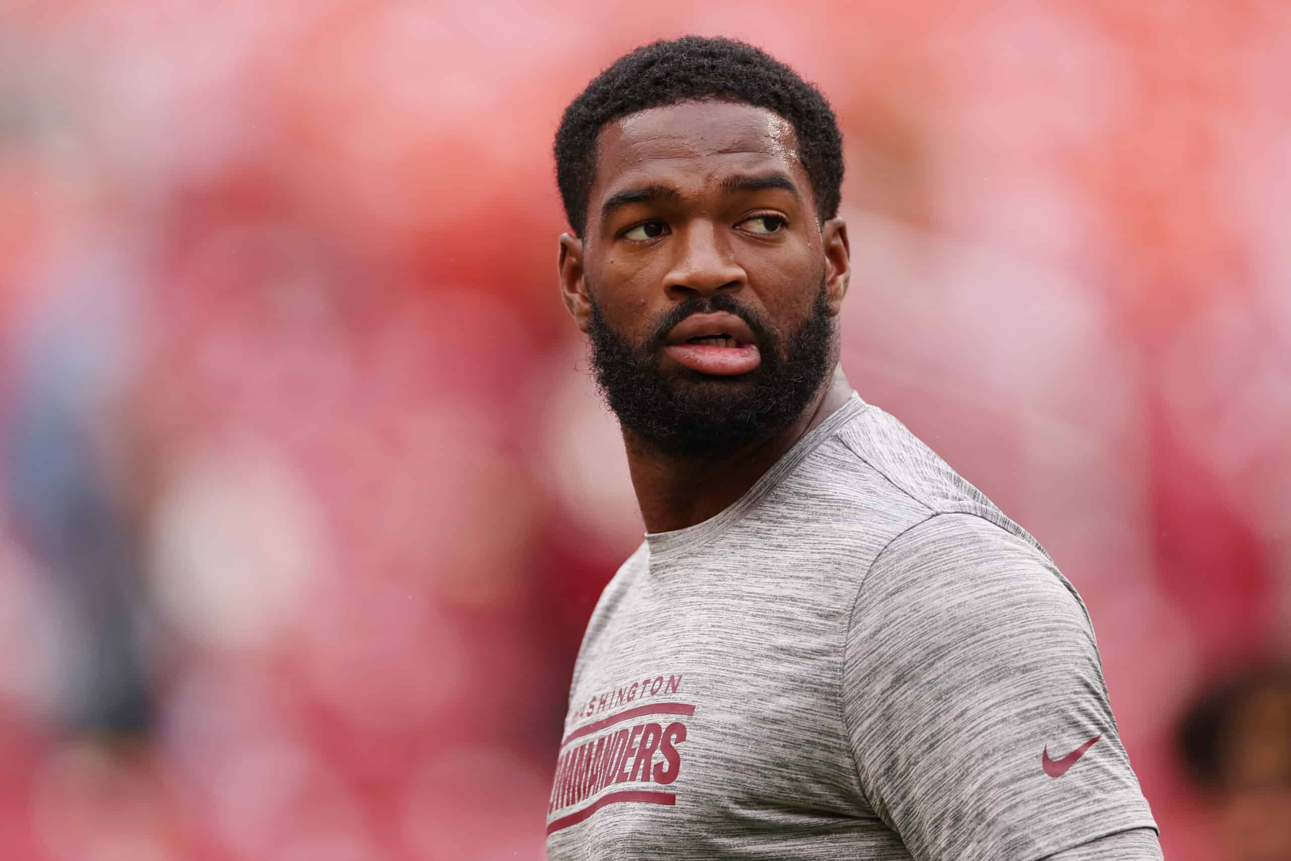 Jacoby Brissett #12 of the Washington Commanders looks on before his game against the Arizona Cardinals at FedExField on September 10, 2023 in Landover, Maryland.